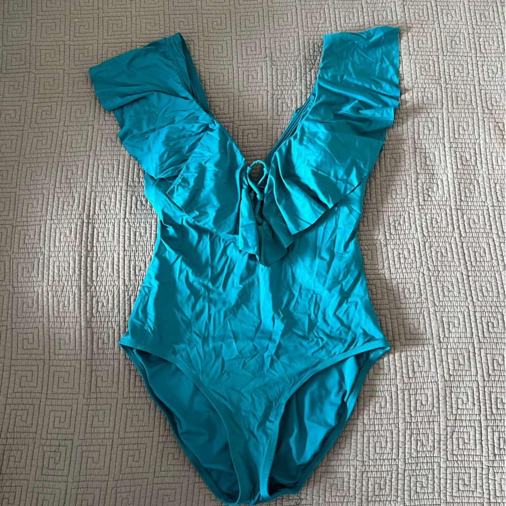 Jantzen one piece, ruffle sleeves and plunge v neck line